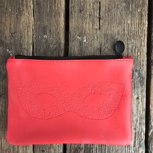 Red mask Ipsy bag